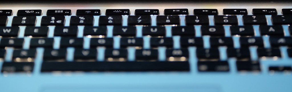 Computer keyboard on a desk