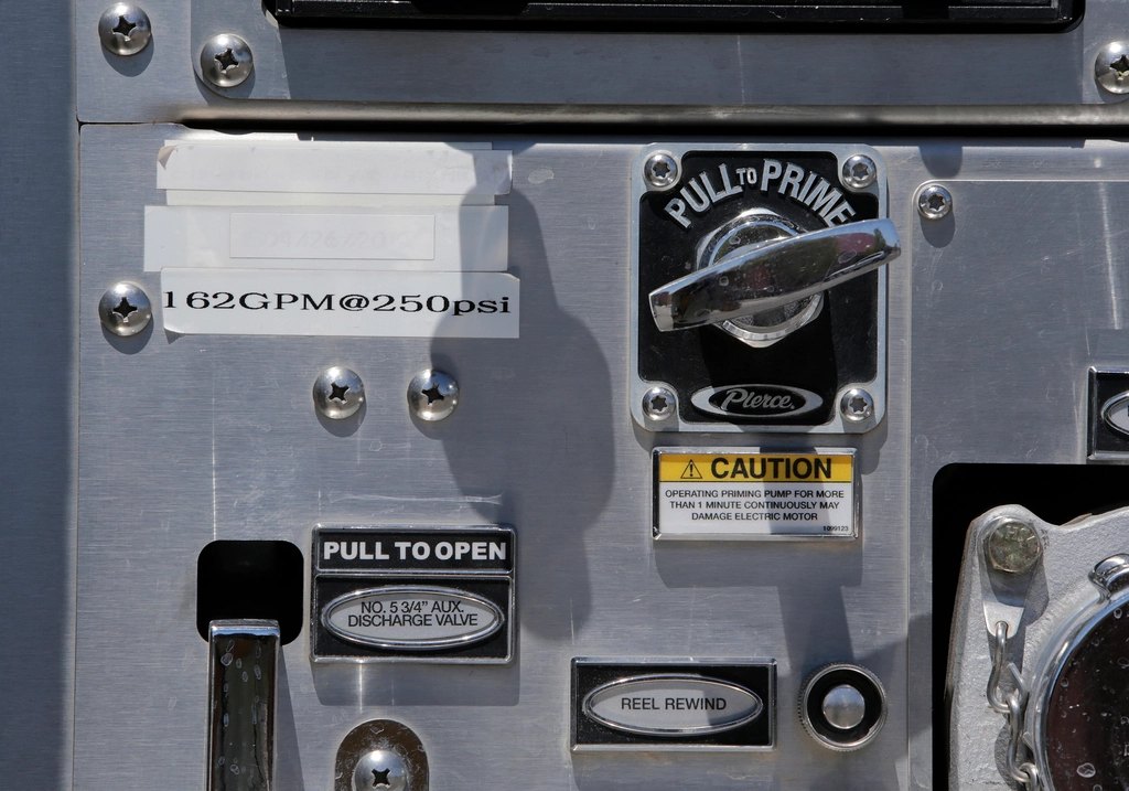 Fire engine pump panel controls close-up
