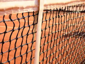Close-up of a tennis court net